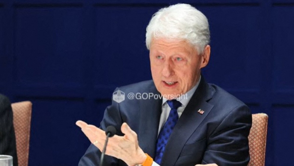Ex-US president Clinton explains hot tub, pool photos from Epstein files